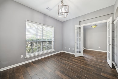 Double Windows Enhance This Formal Dining Space