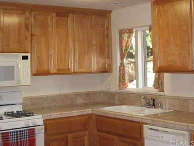 Updated cabinets and counters and sink.