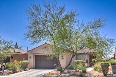 Mediterranean / spanish-style home featuring an at