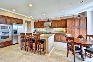 Beautiful Maple Cabinetry and Stainless Steel Appl