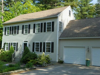 Surrounded by perennial gardens,...
