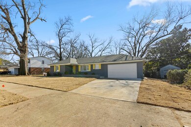 Single story home with a garage