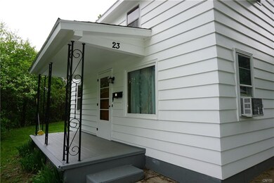This front porch is waiting for some chairs.... The next image is the view from the porch.