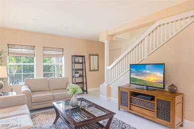 Tiled living room with decorative columns