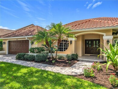Mediterranean / spanish-style house featuring french doors, stucco siding, an attached garage, and a tiled roof
