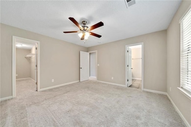 Unfurnished bedroom featuring a textured ceiling, 
