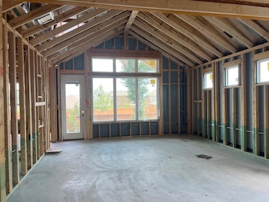 Misc room with vaulted ceiling