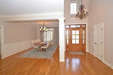 Entry way with sand and finished HW floors.