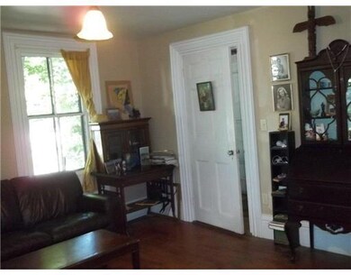 Living Room. Door to front entry...