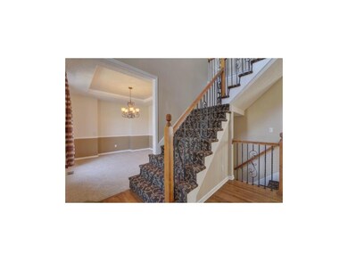 Impressive Entry with Designer Carpet and Iron Spi