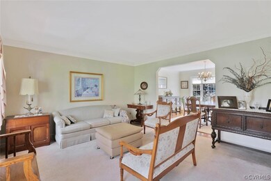 Formal Living Room opens to the Dining Room, featu