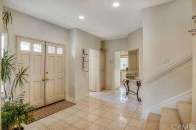 Elegant French doors accent the entrance.