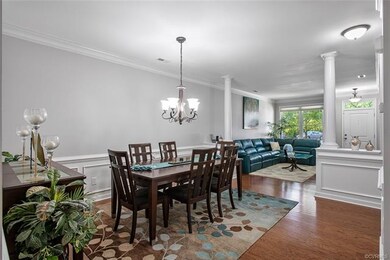Elegant Dining room with picture frame wainscottin