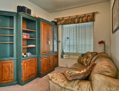 TV Room easily converts into a parlor or office sp