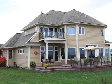 Exterior Back. Two Trex decks. One of the master b