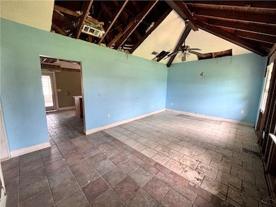 Living room with cathedral ceiling upon entering