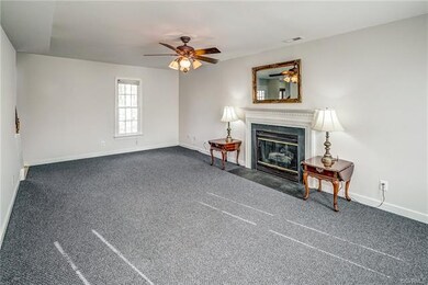 Spacious living area with fireplace