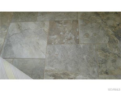 Travertine Tile Floor in Sunroom