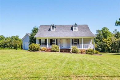 WONDERFUL covered front porch with room for your swing, rocking chairs or bistro set.