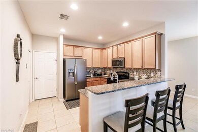 Large kitchen with breakfast bar