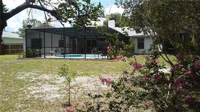 HOME SEEN FROM BACK YARD