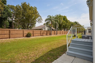 View of yard with a privacy fence