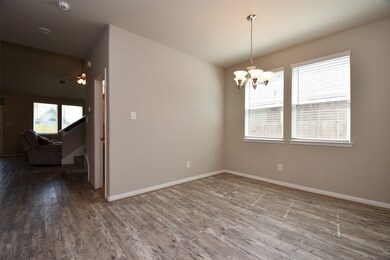 This dining room is bathed in natural
light strea