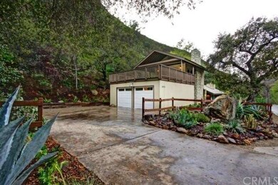 Oversized two-car garage with huge driveway and RV