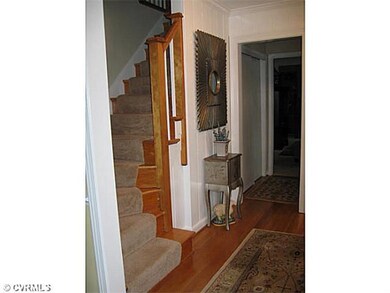 Foyer - Charming Foyer - Curved Stairs, Wainscotti