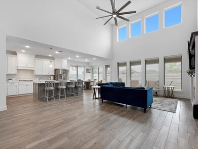 Soaring ceilings, natural light, and open concept
