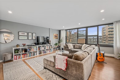 Living Room with Smooth Ceilings and Hi-Hats.