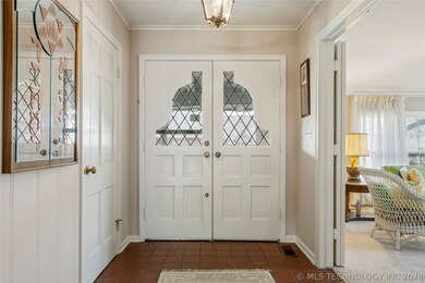 ENTRY OPENS TO FORMAL LIVING ROOM
