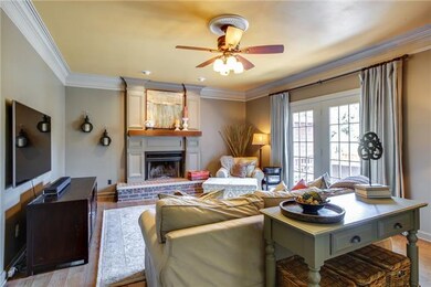 Living room with custom built mantle. 