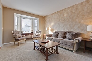 Sun Filled Living Room with Bay Window