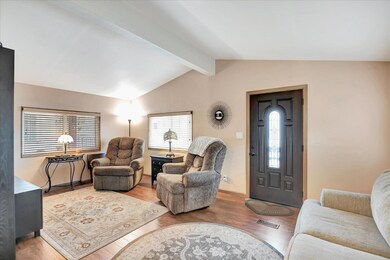 Recently painted, upgraded front door and floors.