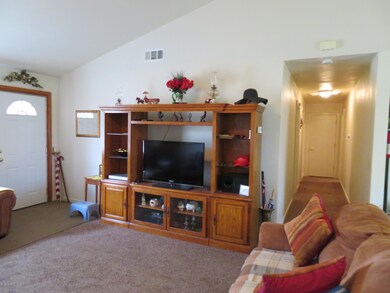 Living room and hallway to bedrooms