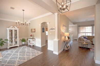 Entry to the home is a gorgeous foyer as you approach the formal dining room as well as the family room.