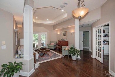 Rich hardwoods and soaring ceilings