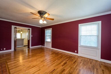 Crown molding and custom window dressing.