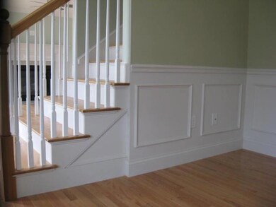 Photo of stairwell and dining room...