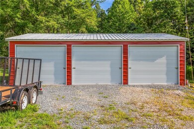 24x35 metal building/garage. Perfect for storing your vehicles, side-by-side, kayaks, AND more!