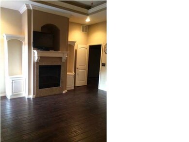 master bedroom features hand scraped hardwood floo
