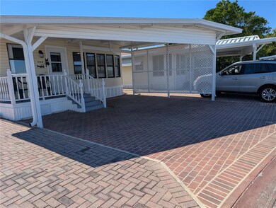 FRONT VIEW CAMERA W/ OVERSIZED CARPORT