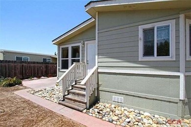 Front door...open to living room and Kitchen area.