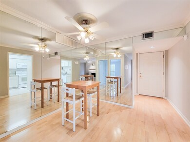 View from dining area to front entry.