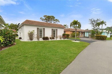 View of front of property with a front lawn