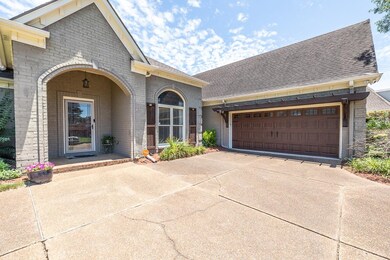 View of front of home featuring a garage