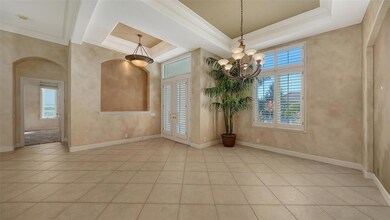 Foyer-tile on diagonal, niche, tray ceilings
