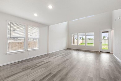Empty room with wood finished floors and recessed