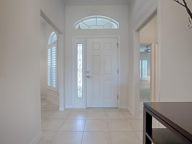 CERAMIC TILE IN FOYER, KITCHEN, HALLWAYS, LAUNDRY 